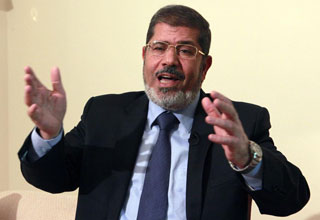 بالفيديو>أحد قتلة السادات(يهدد مرسى بالأغتيال)
