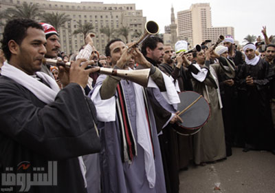 فرقة شعبية تغني للثورة من ميدان التحرير    تصوير: هبة خليفة
